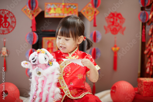 Chinese baby girl traditional dressing up celebrate Chinese new year © M-image