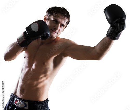 Male Boxer / Kickboxer Punching © BillionPhotos.com