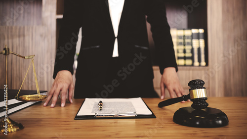 Real Estate concep, judge gavel / lawyer consultant in auction.