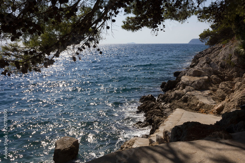 LAPAD, CROATIA - AUGUST 23 2017: Lapad cliff side, facing adriatic sea © greta gabaglio