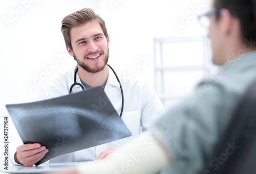 doctor examining x-ray picture of the patient © FotolEdhar
