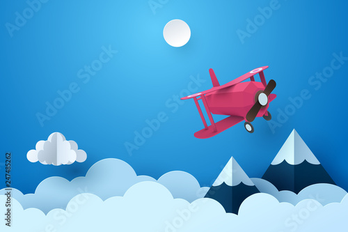 Paper art of plane flying through cloud at night, paper art concept and tourism idea