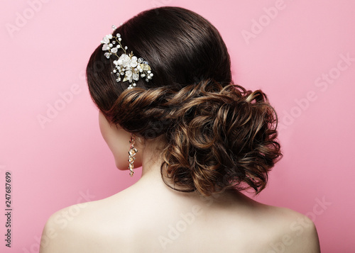 young woman with beautiful hairstyle and stylish hair accessory © Raisa Kanareva