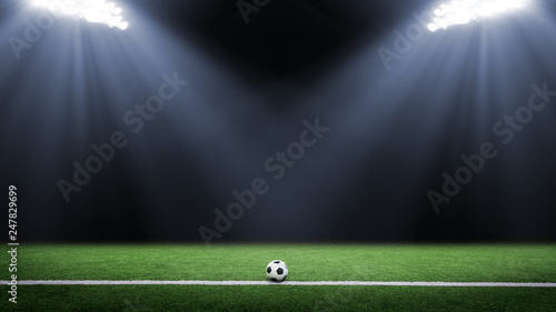 Tradition soccer ball illumintaed by stadium lights © Mariusz Blach