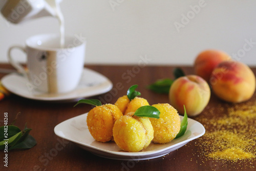 Peach shaped cookies with nut and caramelized milk inside © Ekaterina
