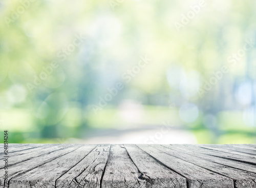 wooden table and spring blurred background © andreusK