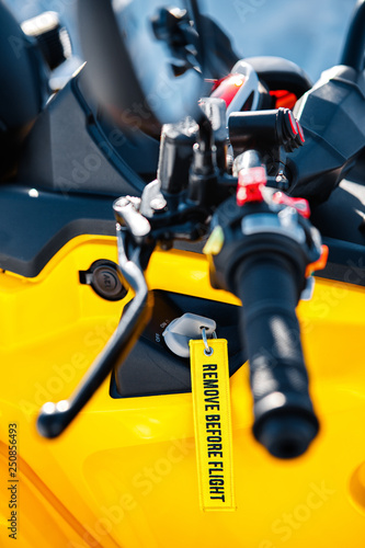 Close up photo of steering wheel of ATV 4wd quad bike. Moto winter sports. © Screaghin