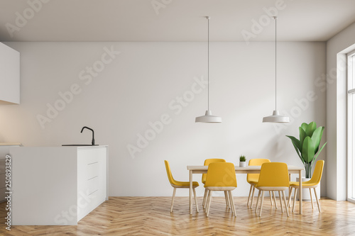 White kitchen with bar and table © denisismagilov