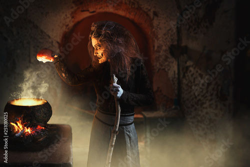 Witch Reads Spell Over Pot With Human Body Parts Buy Photos Ap