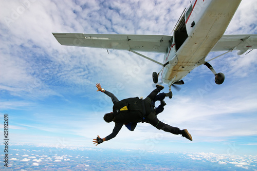 Skydiving tandem jump out of plane