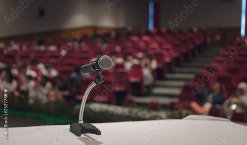Microphone on the table in seminar or conference hall © bigy9950