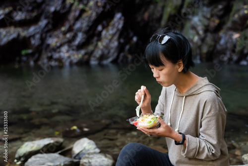 Asian woman eat salad © ChenPG