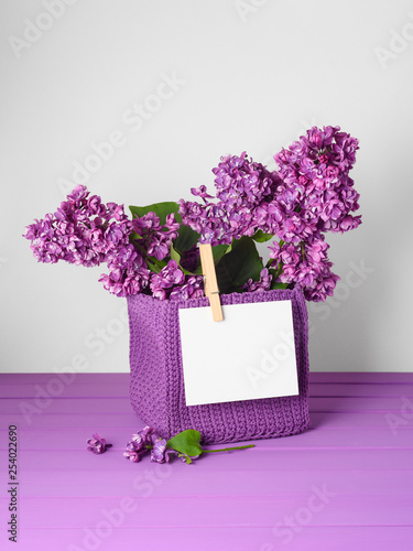 Spring card with empty notes and lilac flowers © Oleksandr Kotenko
