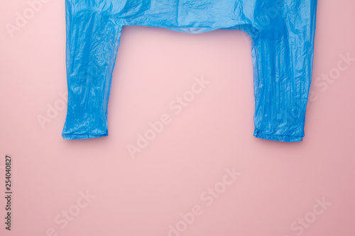 Market blue cellophane. No polyethylene. Top view. pink background