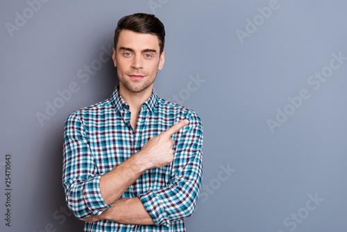 Close up photo attractive amazing he him his man hands arms finger show empty space perfect hair styling sale discount wearing casual plaid checkered outfit isolated grey background