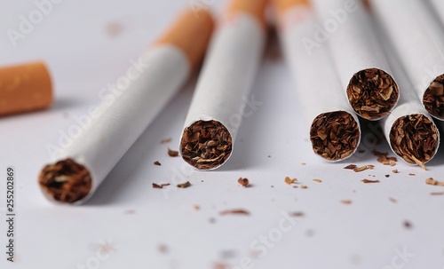 cigarettes on white background © murat