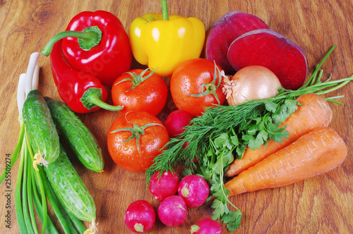 Appetizing vegetables. Tomatoes, radish, carrots, peppers, cucumbers, beet © yrafoto