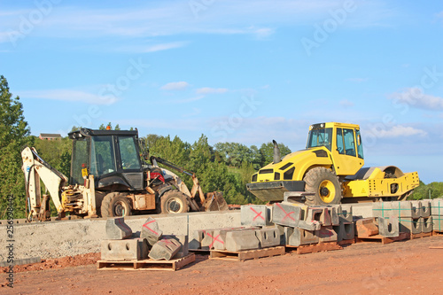 Roller and digger on a construction site © Jenny Thompson