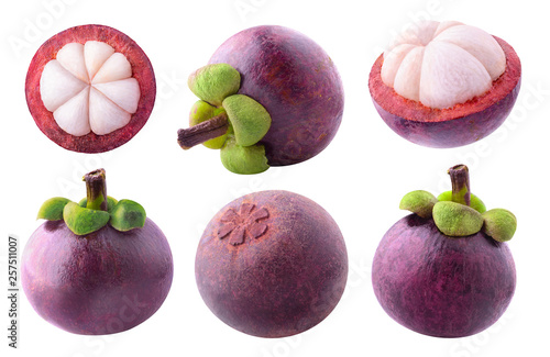 Isolated mangosteens. Collection of whole and cut mangosteen fruits isolated on white background with clipping path © Anna Kucherova