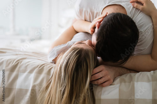 Portrait of young loving couple in bedroom © nd3000