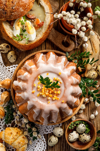 Easter yeast cake with icing and candied orange peel, top view. Delicious Easter dessert, traditional Easter pastries in Poland © zi3000