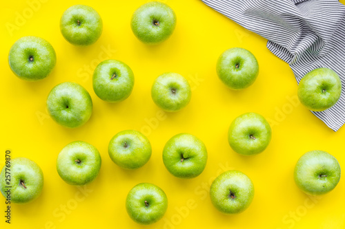 green apples for organic summer food pattern on yellow background top view © 9dreamstudio