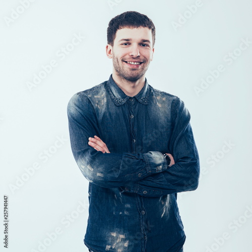 portrait of stylish young man on a white background © yurolaitsalbert