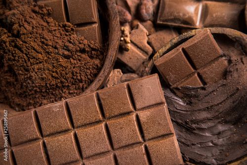 Chocolate bar, candy sweet, cacao beans and powder © Sebastian Duda