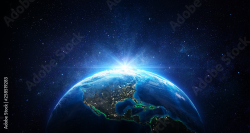 Sunrise In The Space - Blue Earth With City Lights - Usa elements of this image furnished by NASA - 3d Rendering © Romolo Tavani