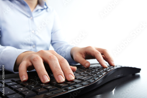 Hands typing keyboard. © Kurhan