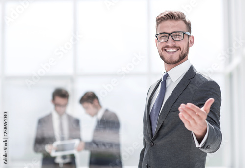 smiling businessman welcome handshake © ASDF
