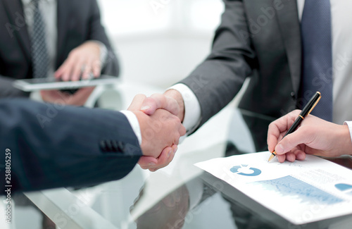 close up.handshake of business partners © ASDF