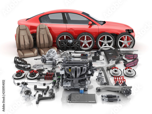 Red car body disassembled and many vehicles parts © Vlad Kochelaevskiy