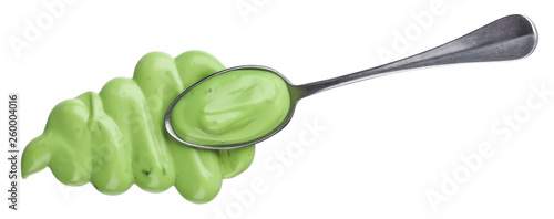Garlic sauce isolated on white background, top view, spoon of green mayonnaise sauce © xamtiw