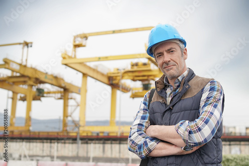 Construction worker on industrial sight looking at camera © goodluz