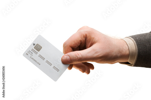 Man hand holds white credit card isolated on white background © sonate