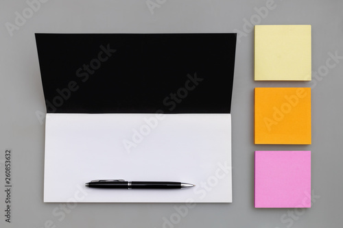 Business copy space with luxury notebook, pen and multicolored sticky notes, top view © sonate