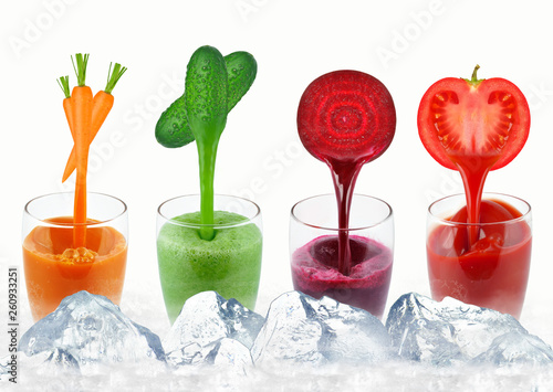vegetable juices in a glass and ice isolated on white © slawek_zelasko