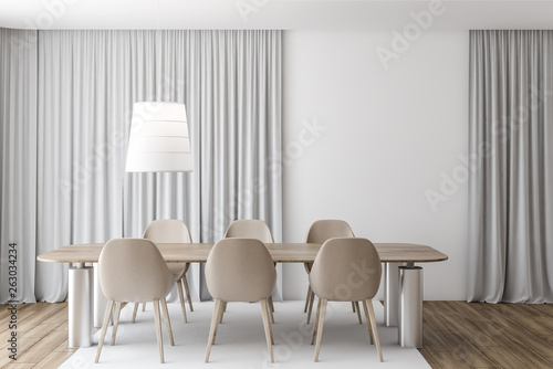 Gray curtain dining room, beige chairs © denisismagilov