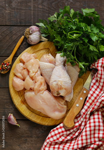 raw chicken meat on a cutting board © dream79