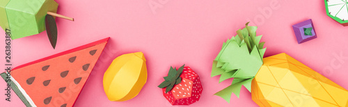 panoramic shot of multicolored handmade paper fruits isolated on pink
