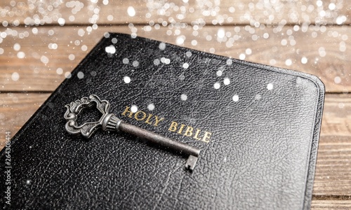 Holy Bible book on wooden background © BillionPhotos.com