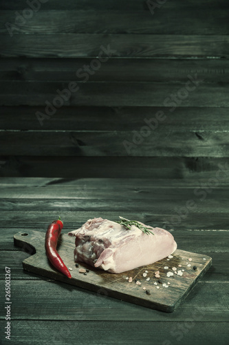 Raw pork on cutting board © firewings